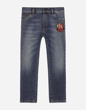 SLIM-FIT BLUE WASH JEANS WITH HERALDIC PATCH