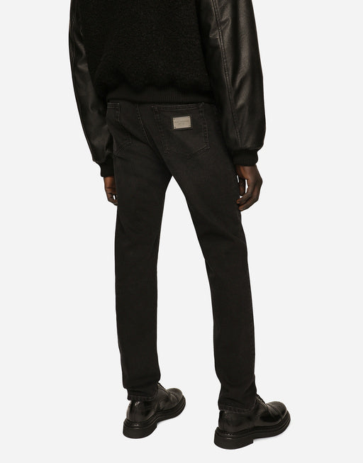 SLIM STRETCH DENIM JEANS WITH SMALL ABRASIONS