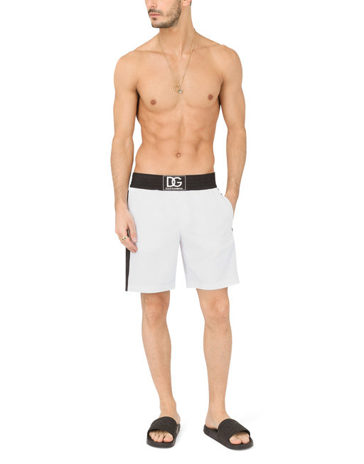 TWO-TONE MID-LENGTH SWIM TRUNKS WITH DG PATCH