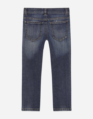 SLIM-FIT BLUE WASH JEANS WITH HERALDIC PATCH