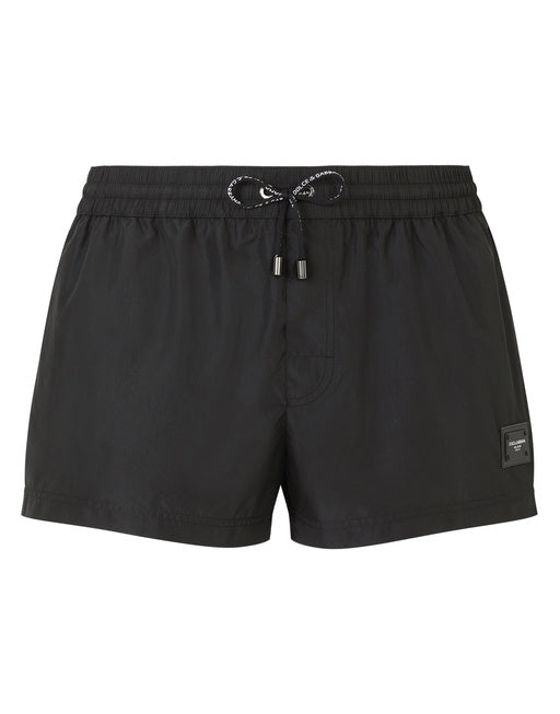 SHORT SWIM TRUNKS WITH BRANDED PLATE