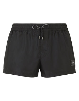 SHORT SWIM TRUNKS WITH BRANDED PLATE