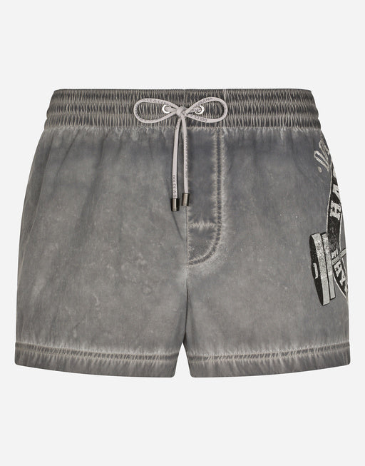 SHORT PRINTED SWIM TRUNKS