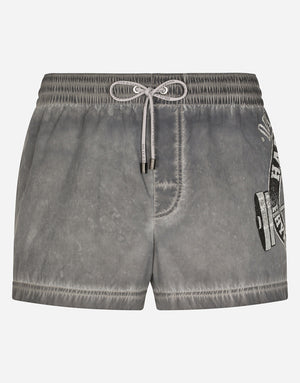 SHORT PRINTED SWIM TRUNKS
