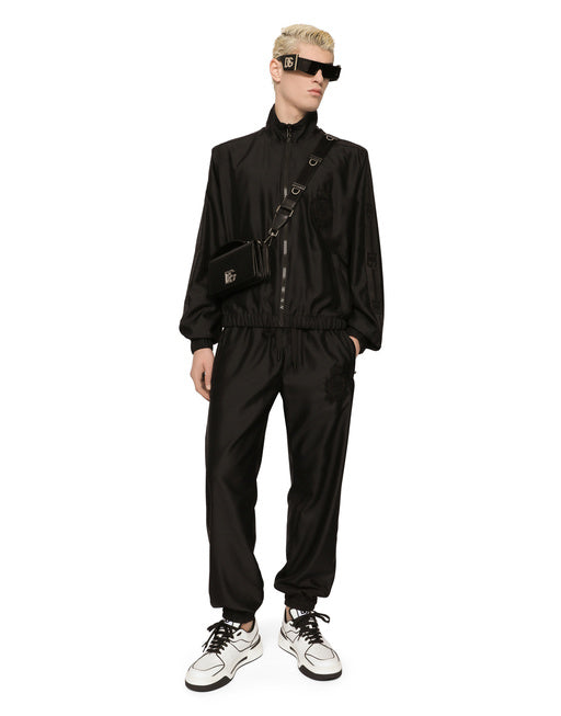 TECHNICAL SILK JOGGING PANTS WITH HERALDIC EMBROIDERY