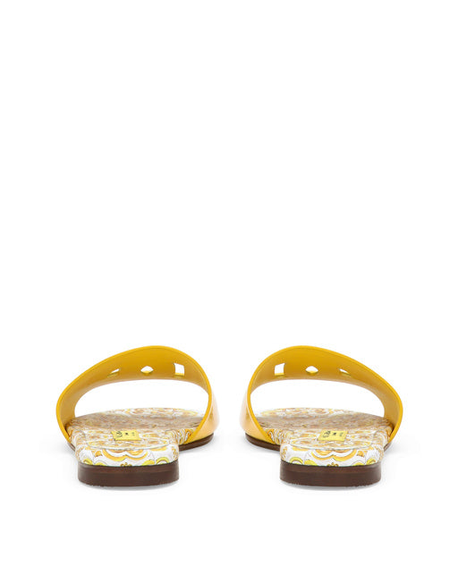 PATENT LEATHER SLIDERS WITH YELLOW MAJOLICA PRINT AND CUT-OUT DG DETAIL