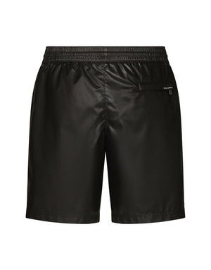 MID-LENGTH SWIM TRUNKS WITH BRANDED BAND