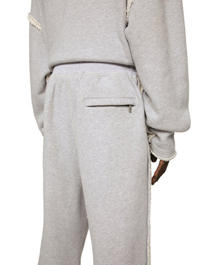 PRINTED JOGGING PANTS WITH SMALL ABRASIONS
