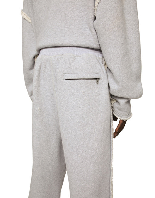 PRINTED JOGGING PANTS WITH SMALL ABRASIONS