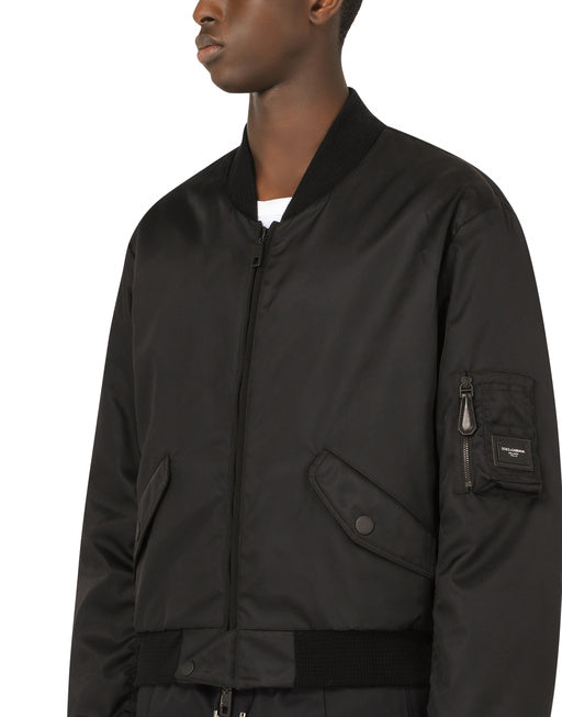 NYLON JACKET WITH BRANDED PLATE