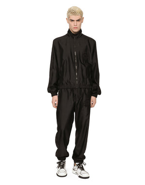 TECHNICAL SILK JOGGING PANTS WITH HERALDIC EMBROIDERY