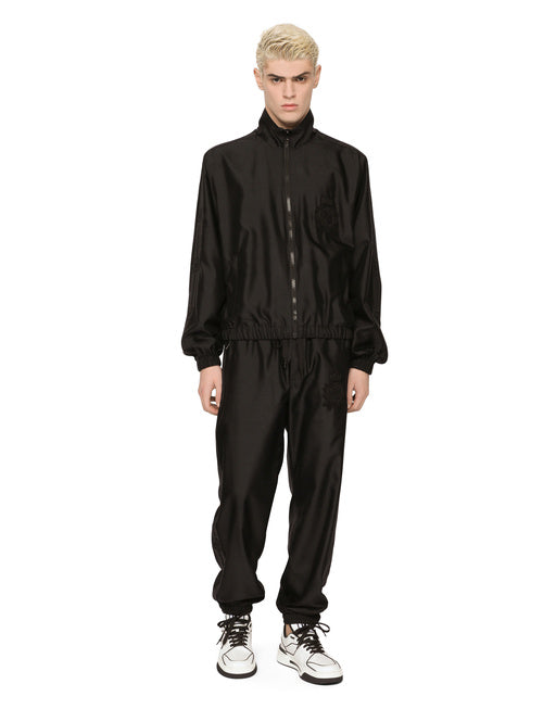 TECHNICAL SILK JOGGING PANTS WITH HERALDIC EMBROIDERY