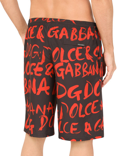 LONG SWIM TRUNKS WITH LOGO PRINT