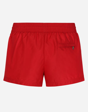 SHORT SWIM TRUNKS WITH BRANDED TAG