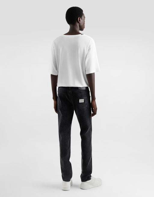 SKINNY JEANS IN STRETCH COTTON WITH PLAQUE