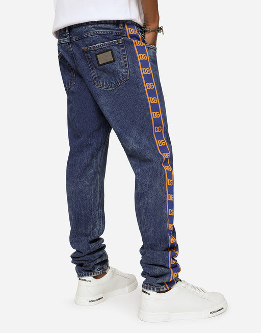 LIGHT BLUE SLIM-FIT JEANS WITH BRANDED BANDS