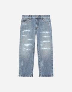 WASHED DENIM JEANS WITH ABRASIONS