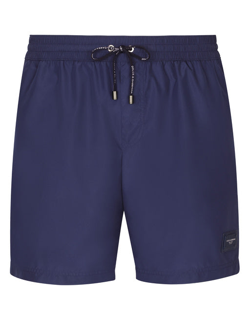 MID-LENGTH SWIM TRUNKS WITH BRANDED PLATE