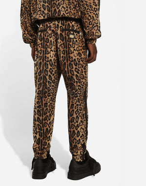 CRESPO LEO PRINT JOGGING PANTS WITH PLAQUE