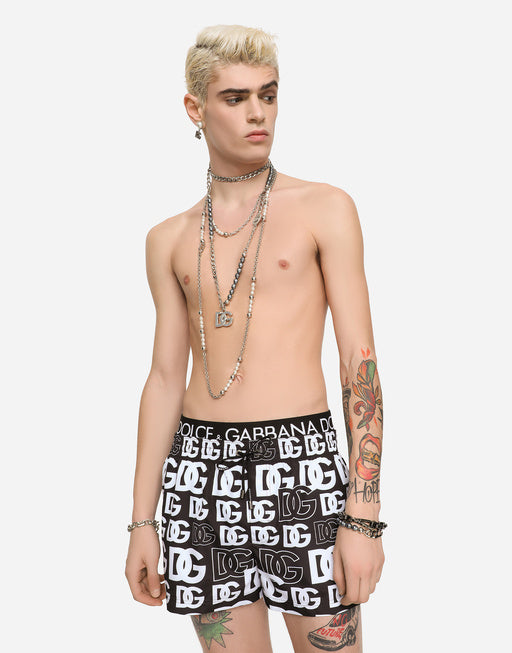 SHORT SWIM TRUNKS WITH ALL-OVER DG PRINT