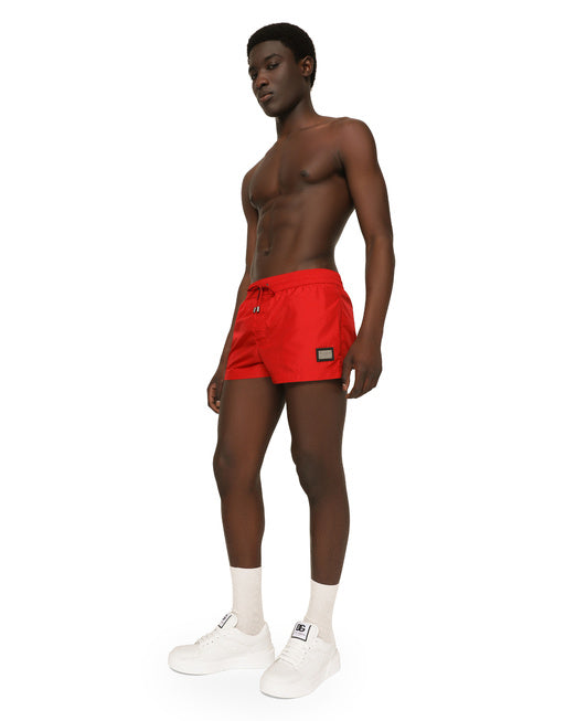 SHORT SWIM TRUNKS WITH BRANDED TAG