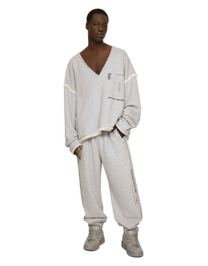 PRINTED JOGGING PANTS WITH SMALL ABRASIONS
