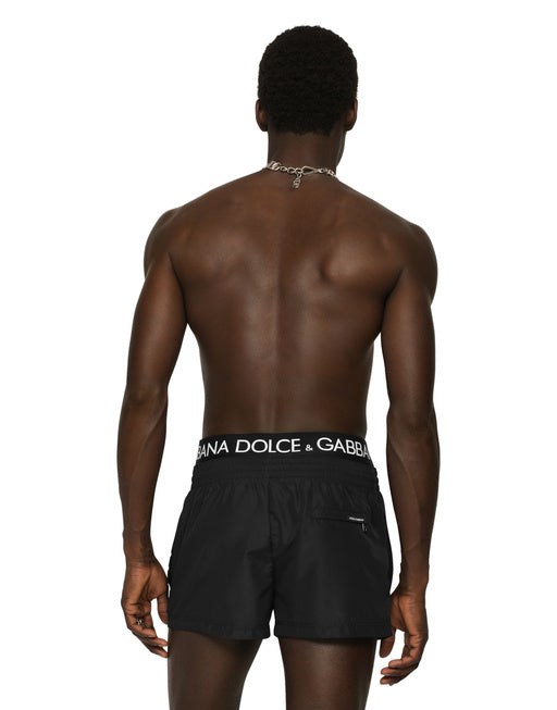 SHORT SWIM TRUNKS WITH BRANDED BAND