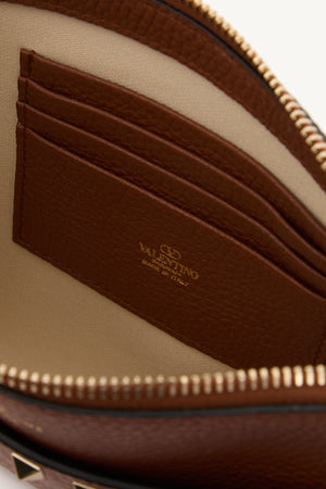 POUCH ROCKSTUD IN VITELLO GRANATO