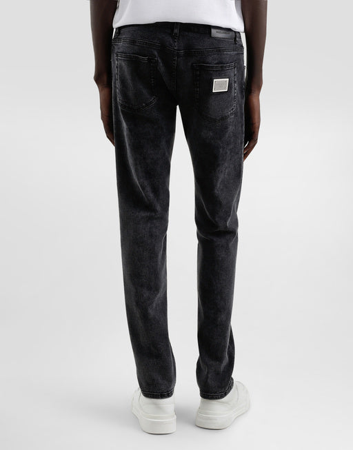 SKINNY JEANS IN STRETCH COTTON WITH PLAQUE