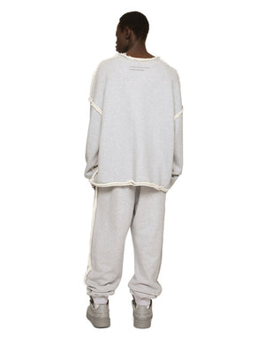 PRINTED JOGGING PANTS WITH SMALL ABRASIONS