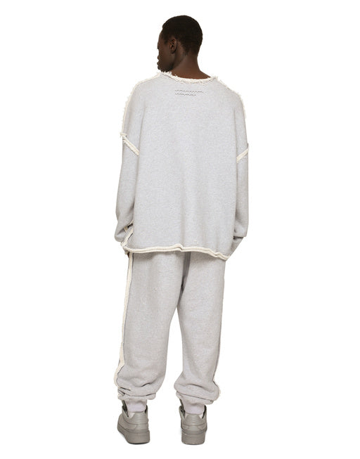 PRINTED JOGGING PANTS WITH SMALL ABRASIONS