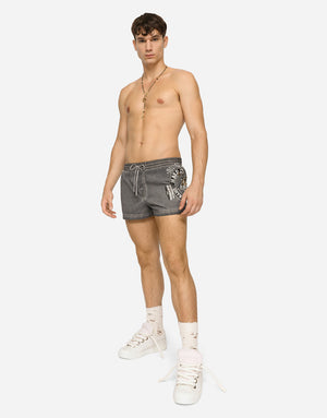 SHORT PRINTED SWIM TRUNKS