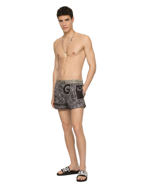 SHORT SWIM TRUNKS WITH LOGO PRINT