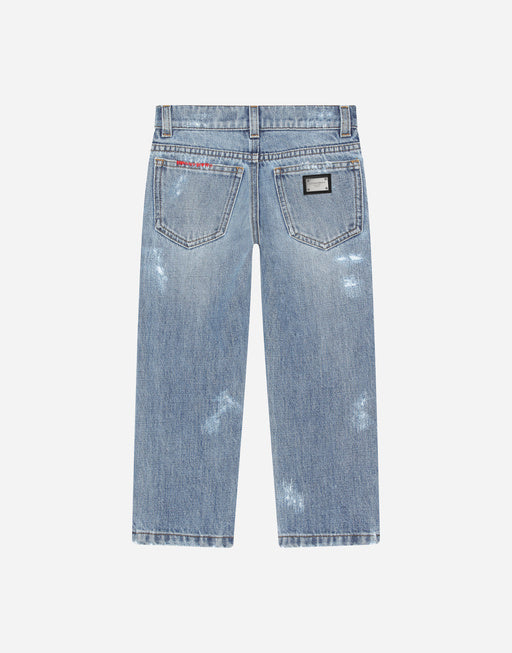 WASHED DENIM JEANS WITH ABRASIONS