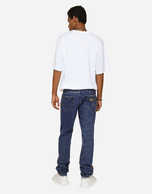 LIGHT BLUE SLIM-FIT JEANS WITH BRANDED BANDS
