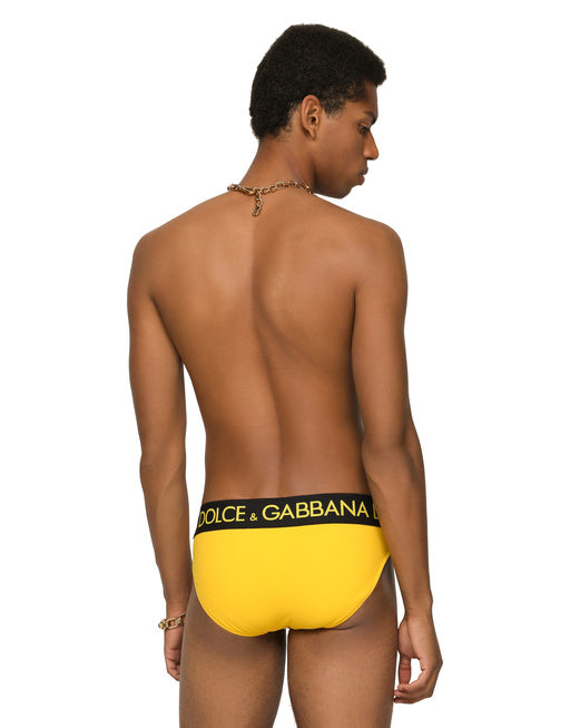 SWIM BRIEFS WITH HIGH-CUT LEG AND BRANDED REAR WAISTBAND