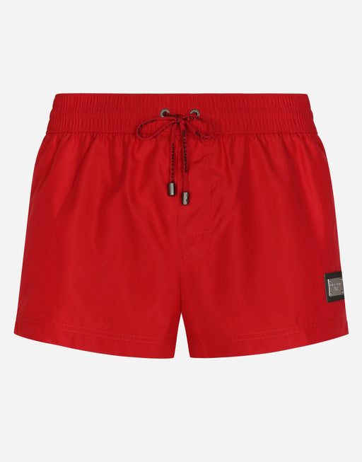 SHORT SWIM TRUNKS WITH BRANDED TAG