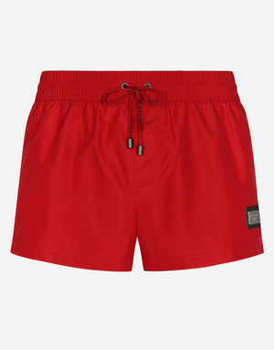 SHORT SWIM TRUNKS WITH BRANDED TAG