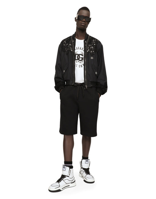 NYLON JACKET WITH LACE INSERTS AND DG PATCH