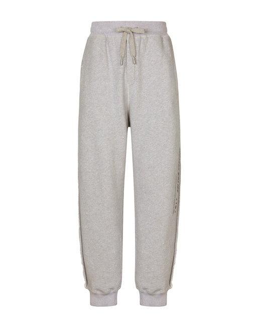 PRINTED JOGGING PANTS WITH SMALL ABRASIONS