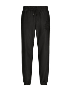 TECHNICAL SILK JOGGING PANTS WITH HERALDIC EMBROIDERY