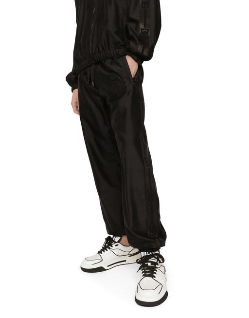 TECHNICAL SILK JOGGING PANTS WITH HERALDIC EMBROIDERY