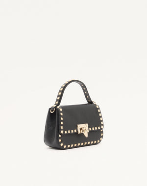 BORSA PICCOLA A MANO ROCKSTUD IN VITELLO GRANATO