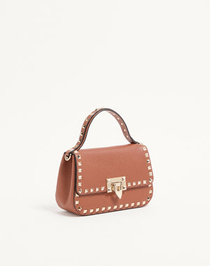 BORSA PICCOLA A MANO ROCKSTUD IN VITELLO GRANATO