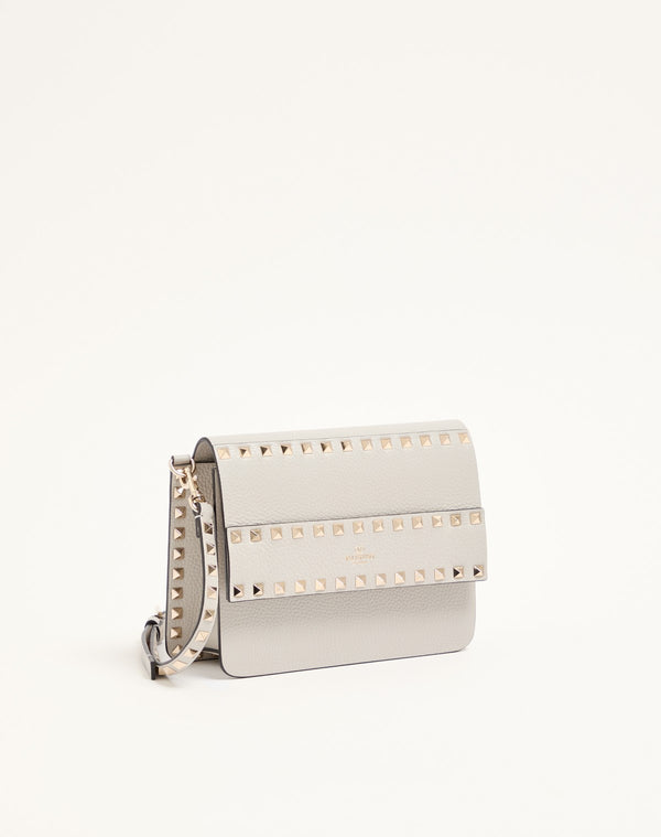 BORSA PICCOLA A TRACOLLA ROCKSTUD IN VITELLO GRANATO