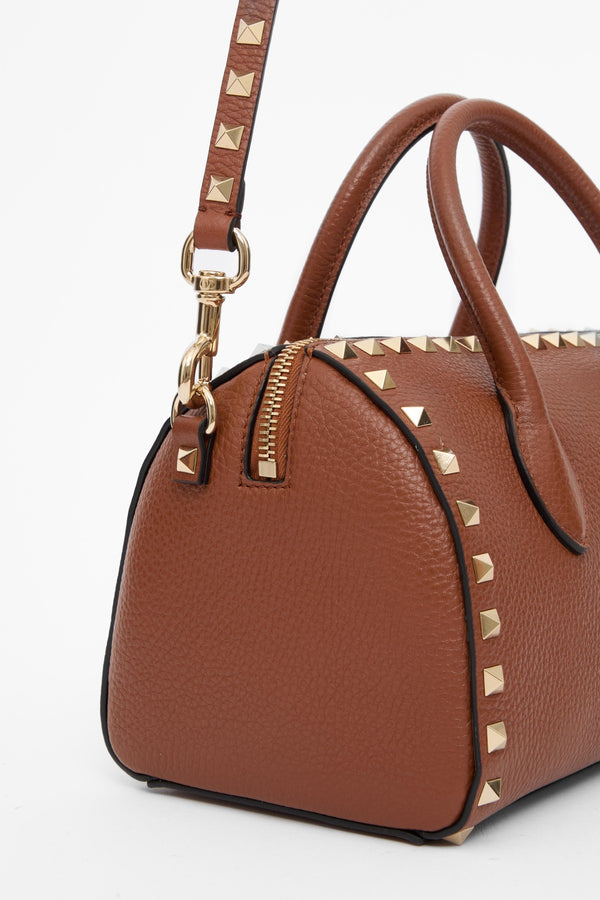 BORSA A MANO ROCKSTUD IN VITELLO GRANATO