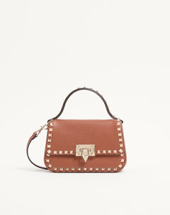 BORSA PICCOLA A MANO ROCKSTUD IN VITELLO GRANATO