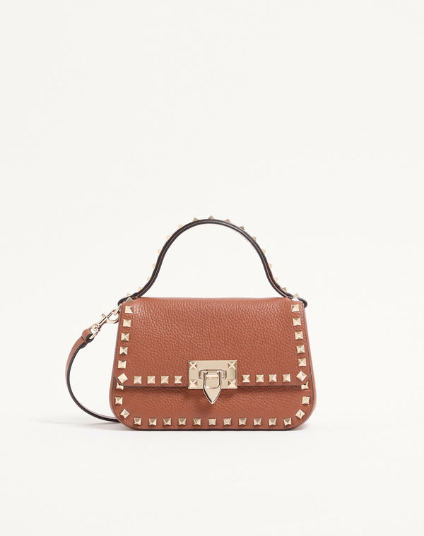BORSA PICCOLA A MANO ROCKSTUD IN VITELLO GRANATO