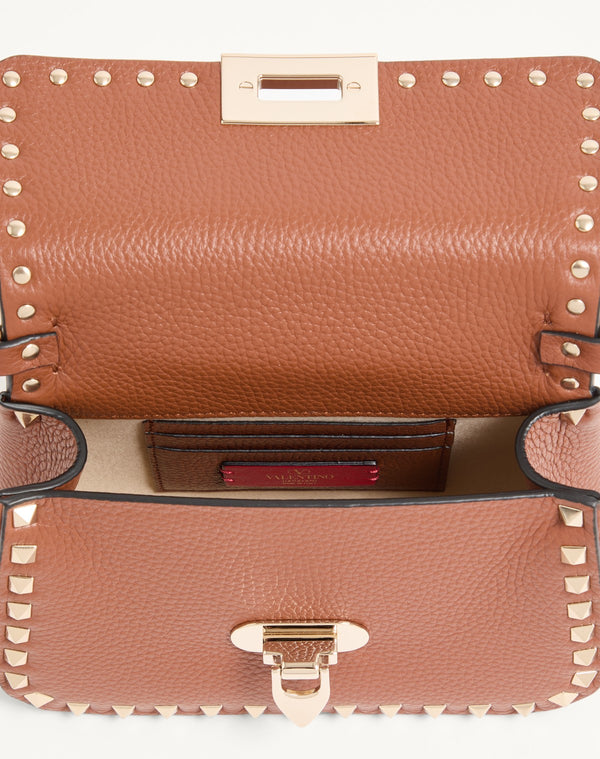 BORSA PICCOLA A MANO ROCKSTUD IN VITELLO GRANATO