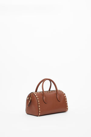 BORSA A MANO ROCKSTUD IN VITELLO GRANATO